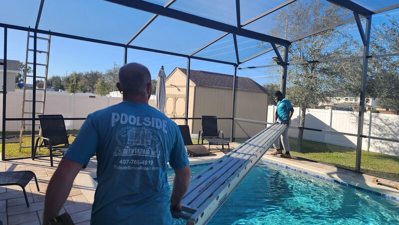 Poolside crew working across a pool cage, replacing screen panels section by section